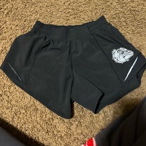 Black lululemon, hotty hot shorts with Gonzaga University logo.